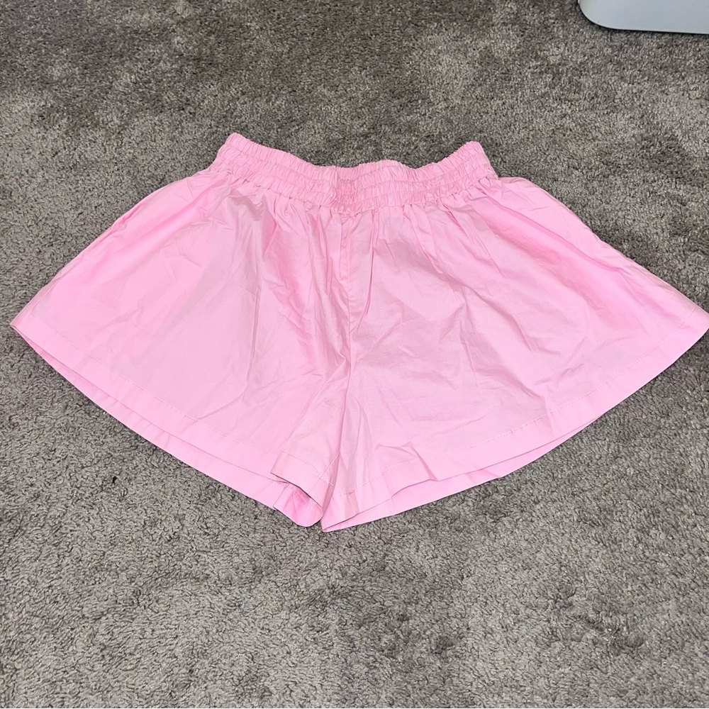 High waisted flare shorts. NWT. Thanne boutique brand. Light pink. Size 8.